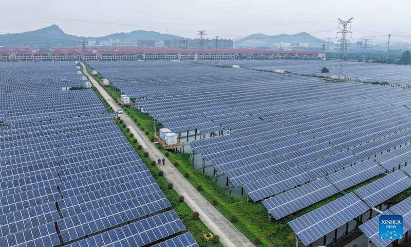 A drone photo shows staff members of State Grid Huzhou power supply company conducting inspection on the photovoltaic lines and equipment at a photovoltaic power station in Changxing County of Huzhou City, east China's Zhejiang Province, May 27, 2026. In recent years, State Grid Huzhou power supply company has been constantly promoting the upgrading of the county-level power grids, advancing the integration of renewable energy sources into power grids, and endeavoring to construct a safer, greener and smarter power grid. (Photo: Xinhua)