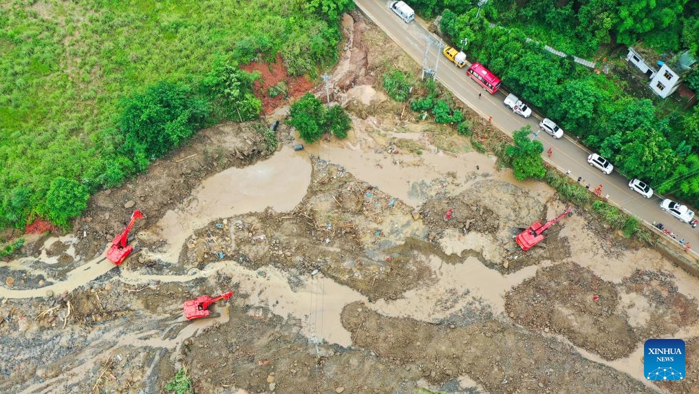 An aerial drone photo taken on May 25, 2026 shows the rescue site of the flood-hit area after a heavy rainstorm hit Yongchuan District in southwest China's Chongqing Municipality. Record-breaking torrential rain battered Yongchuan District in southwest China's Chongqing Municipality from late Saturday to Sunday, triggering flash floods, landslides and mudslides. Rescue operations are still underway as multiple towns and subdistricts suffered severe damage. (Photo: Xinhua)