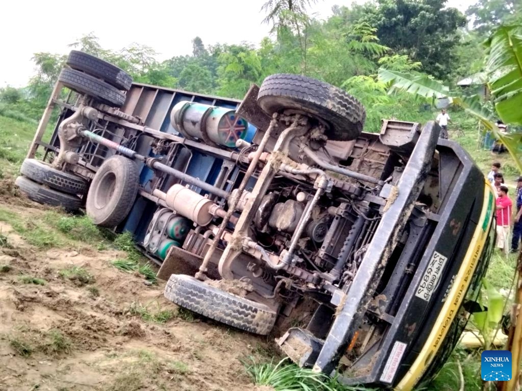 This photo taken on May 25, 2026 shows a scene at the site of a truck accident in Tangail district, Bangladesh. At least 15 people were killed, and six others injured early on Monday when a rod-laden truck overturned into a bridge-side ditch in Bangladesh's Tangail district, some 97 km away from the capital Dhaka. (Photo: Xinhua)