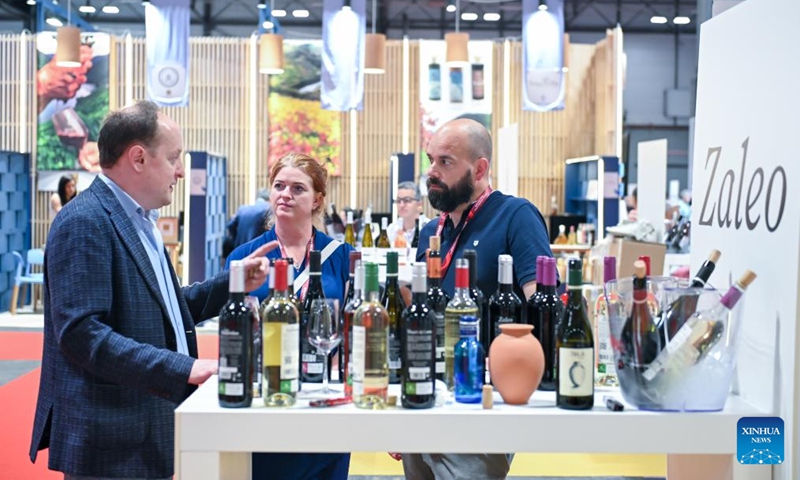 People attend the Madrid International Wine Fair (WINEMAD) in Madrid, Spain, May 27, 2026. The fair opened here on Wednesday and will last till Friday. (Photo: Xinhua)