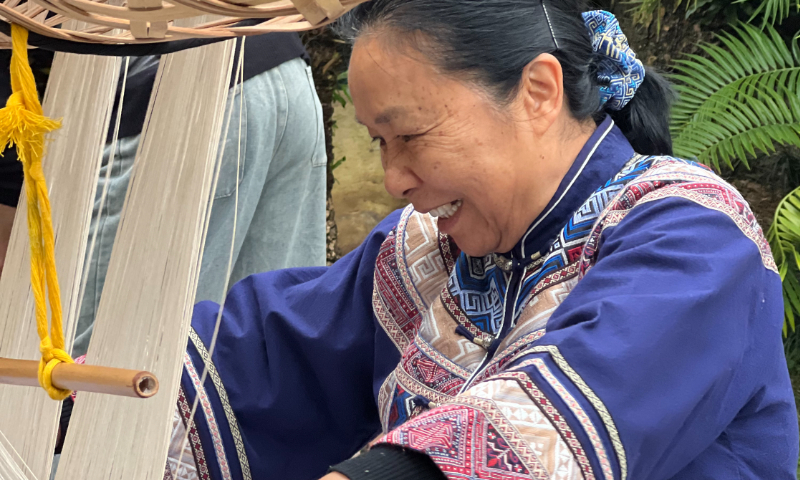 Tan Xiangguang weaves Zhuang brocade in her hometown in the Guangxi Zhuang Autonomous Region. Photos: Courtesy of Tan Xiangguang
