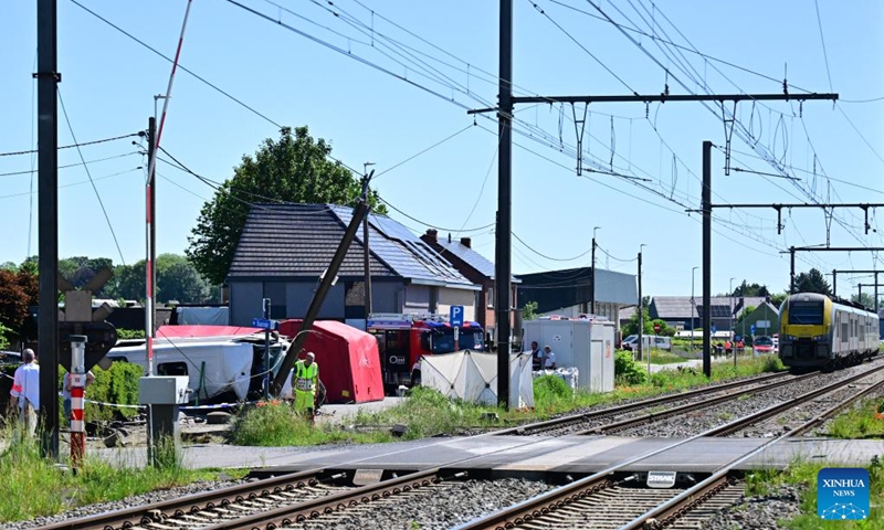 This photo taken on May 26, 2026 shows the scene of a school bus and train collision accident in Buggenhout, East Flanders, Belgium. Four people were killed on Tuesday morning after a school bus rammed into a train at a crossing in the city of Buggenhout, the East Flanders province of Belgium, local media reported. (Photo: Xinhua)
