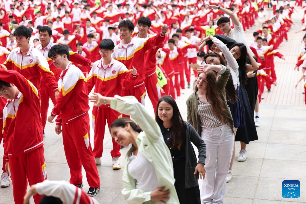 International students do radio calisthenics with local students at Guiyang No. 1 High School in Guiyang in southwest China's Guizhou Province, May 21, 2026. (Photo: Xinhua)