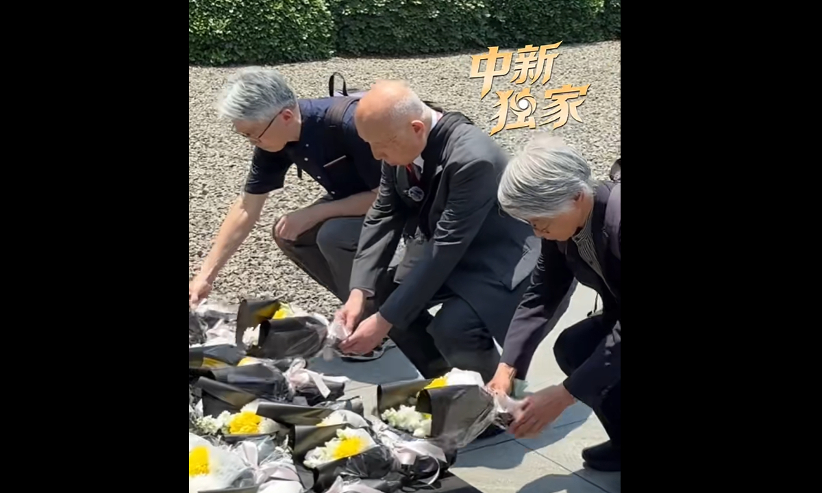 Some Japanese scholars paid tribute to the victims of the Nanjing Massacre, bowing and laying flowers at the Memorial Hall of the Victims in Nanjing Massacre by Japanese Invaders on May 29, 2026. Photo: Screenshot from a China News Service video