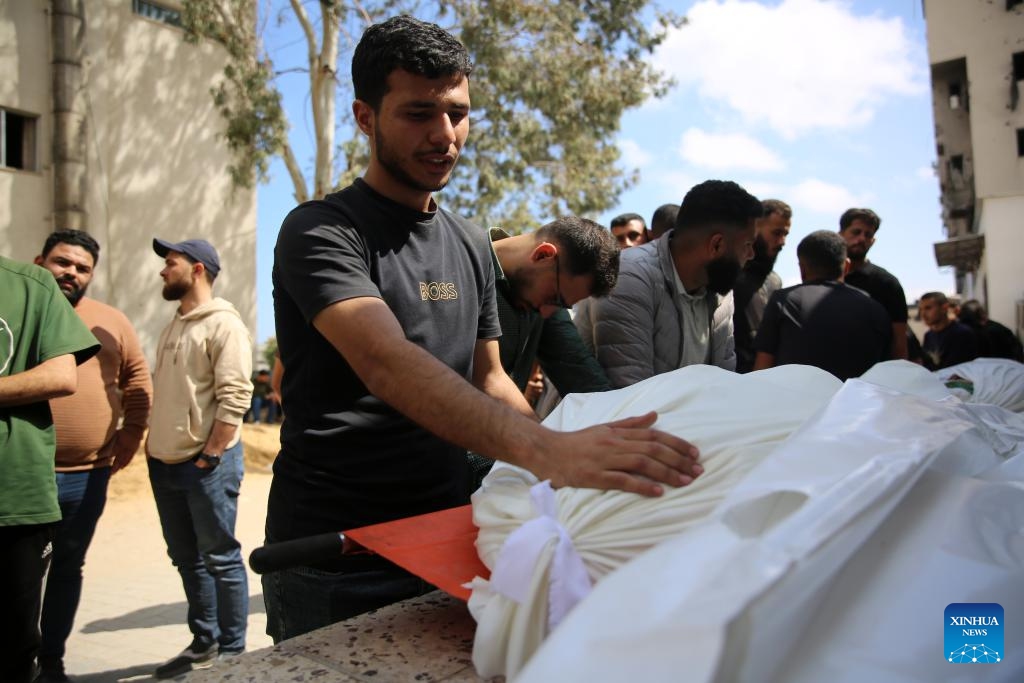 People attend the funeral of Mohammed Odeh and his family members who were killed in an Israeli airstrike, in Gaza City, on May 27, 2026. Hamas on Wednesday officially confirmed that Mohammed Odeh, the newly-appointed commander-in-chief of the group's armed wing, the Al-Qassam Brigades, was killed in an Israeli airstrike on Tuesday evening. (Photo: Xinhua)