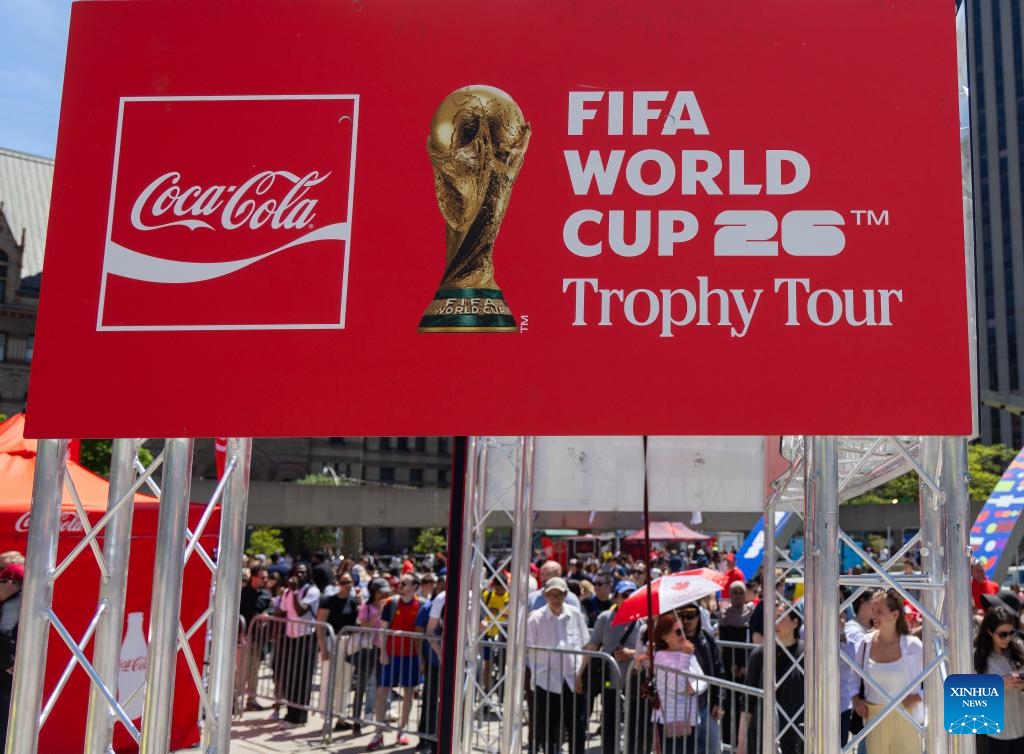 People line up to view the original FIFA World Cup Trophy during the Toronto stop of the FIFA World Cup Trophy Tour at Nathan Phillips Square in Toronto, Canada, on May 26, 2026. (Photo: Xinhua)