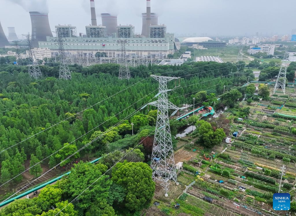 A drone photo taken on May 27, 2026 shows the power lines of an energy storage power station in Changxing County of Huzhou City, east China's Zhejiang Province. In recent years, State Grid Huzhou power supply company has been constantly promoting the upgrading of the county-level power grids, advancing the integration of renewable energy sources into power grids, and endeavoring to construct a safer, greener and smarter power grid. (Photo: Xinhua)