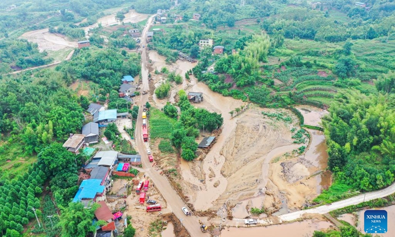 An aerial drone photo taken on May 25, 2026 shows the rescue site of the flood-hit area after a heavy rainstorm hit Yongchuan District in southwest China's Chongqing Municipality. Record-breaking torrential rain battered Yongchuan District in southwest China's Chongqing Municipality from late Saturday to Sunday, triggering flash floods, landslides and mudslides. Rescue operations are still underway as multiple towns and subdistricts suffered severe damage. (Photo: Xinhua)