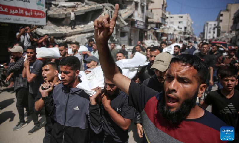 People attend the funeral of Mohammed Odeh and his family members who were killed in an Israeli airstrike, in Gaza City, on May 27, 2026. Hamas on Wednesday officially confirmed that Mohammed Odeh, the newly-appointed commander-in-chief of the group's armed wing, the Al-Qassam Brigades, was killed in an Israeli airstrike on Tuesday evening. (Photo: Xinhua)
