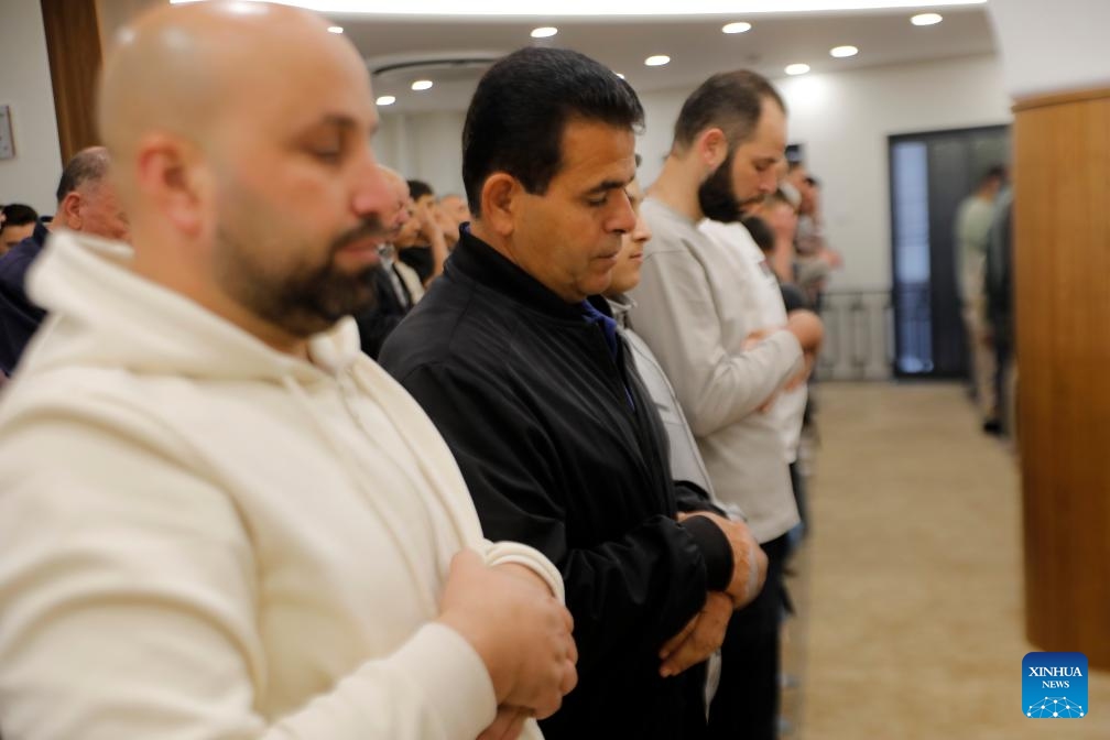 Palestinians offer Eid al-Adha prayers at Al-Hussein Mosque in the West Bank city of Hebron, May 27, 2026. (Photo: Xinhua)