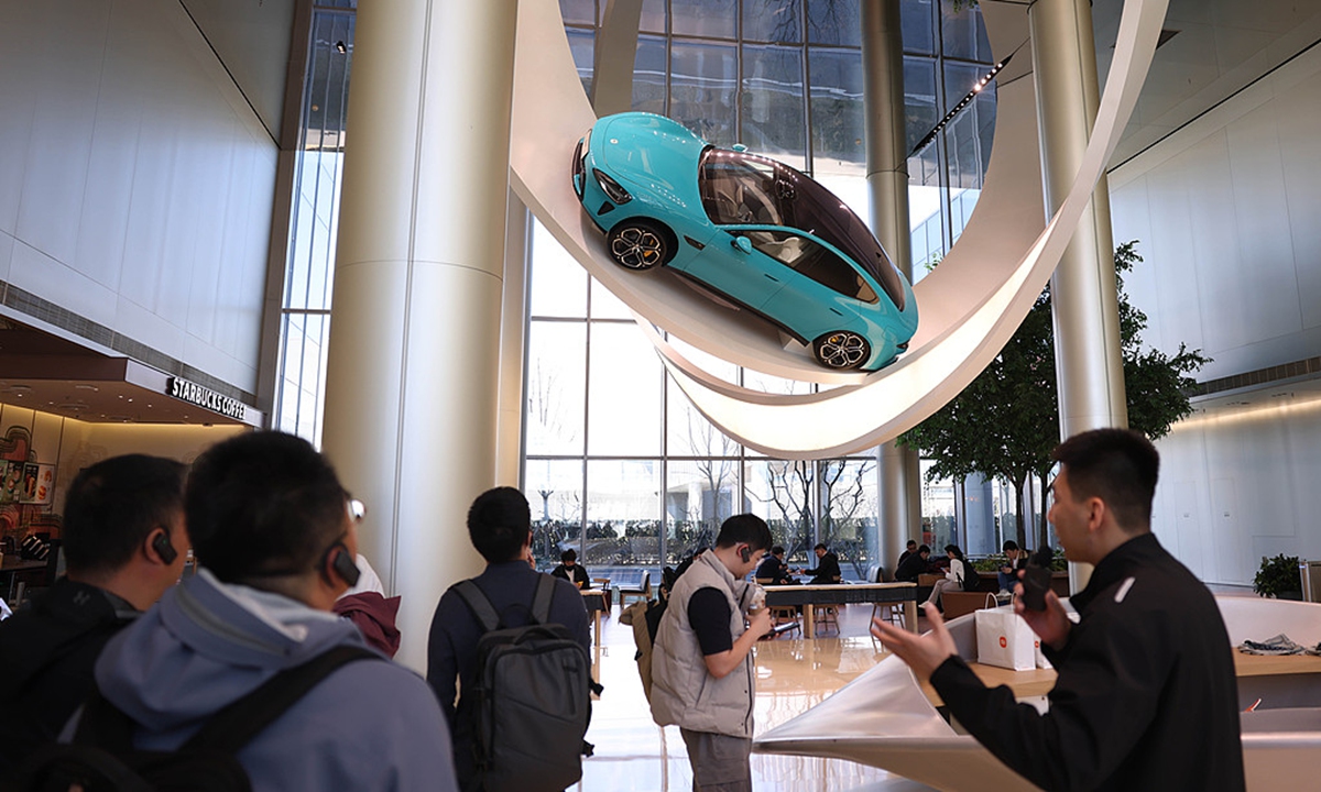 Tourists visit Xiaomi's auto factory in Beijing on March 24, 2025. Photo: VCG