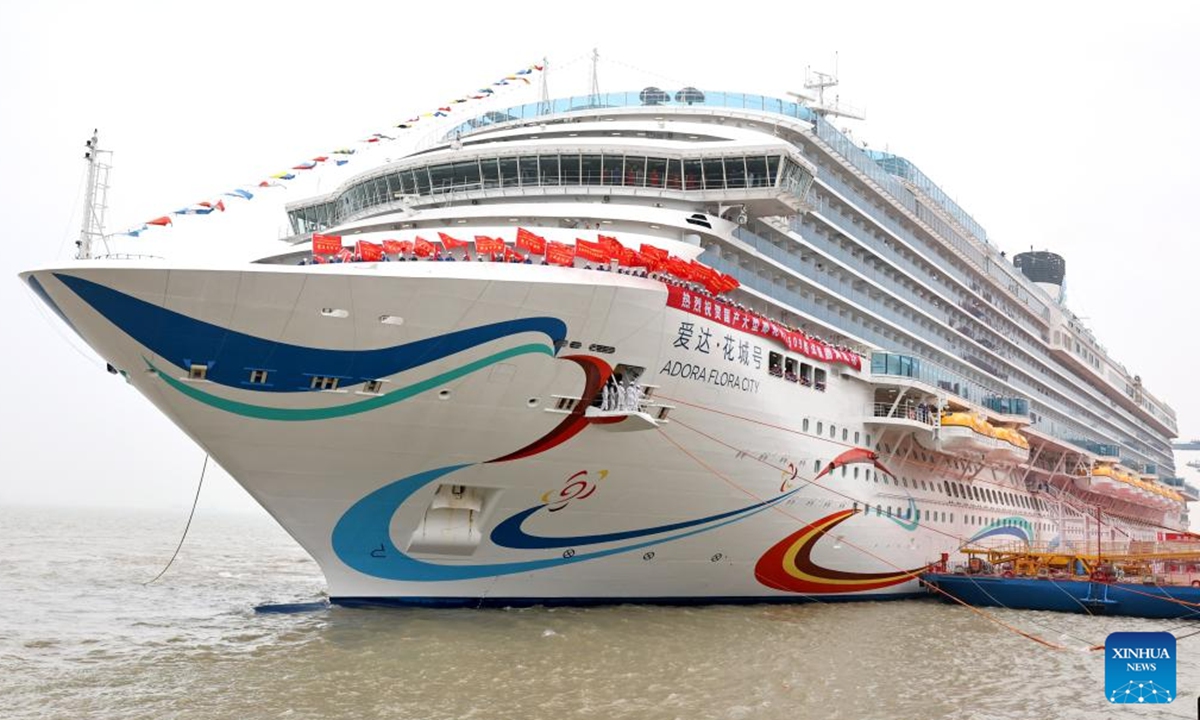 Cruise ship Adora Flora City berths at a port in east China's Shanghai, May 27, 2026. China's second domestically built large cruise ship, the Adora Flora City, returned to port in Shanghai on Wednesday after completing a 12-day maiden sea trial, marking a milestone in the country's push to mass-produce large cruise ships. The ship is scheduled for delivery on November 6 and will operate international routes from the Nansha International Cruise Home Port in Guangzhou, capital of south China's Guangdong Province. (Xinhua/Fang Zhe)