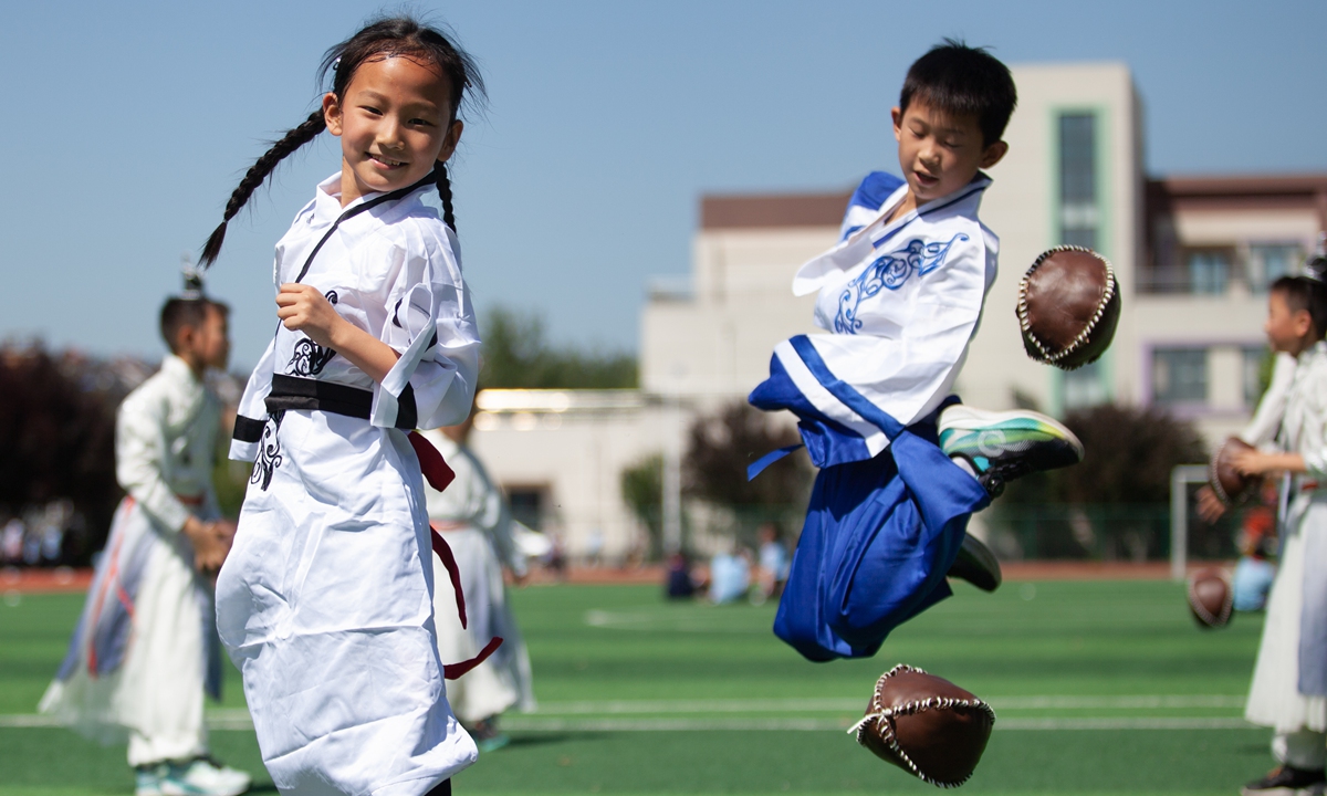 Students play a game of cuju on the playground of a primary school ahead of the upcoming International Children's Day (June 1) in Zibo, East China's Shandong Province, on May 28, 2026. The ancient Chinese ball game of cuju is widely regarded as a forerunner to modern football. Photo: VCG