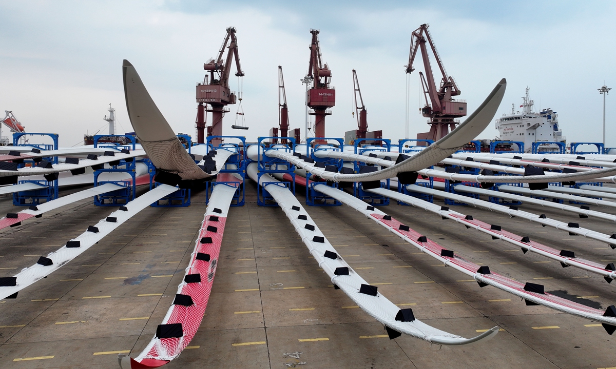 New-energy power equipment at the terminal of Dongfang Port Branch of Lianyungang Port in East China's Jiangsu Province is ready for export. Lianyungang has ramped up efforts this year to develop its wind power equipment industry, with a steady stream of overseas orders keeping manufacturers running at full capacity to meet growing demand at home and abroad. Photo: VCG
