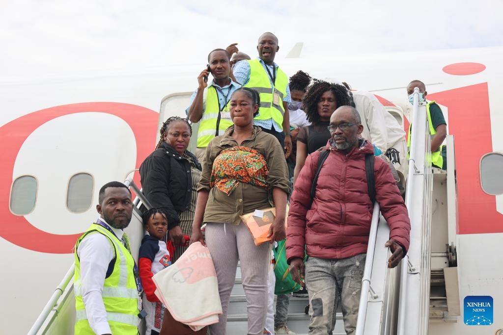 Ghanaian citizens evacuated from South Africa arrive at the Accra International Airport in Accra, Ghana, May 27, 2026. The Ghanaian government has evacuated 300 citizens from South Africa over xenophobic concerns. The first batch, among over 800 citizens registered by the country's mission seeking help to return home, arrived at the Accra International Airport on Wednesday. (Photo by Seth/Xinhua)