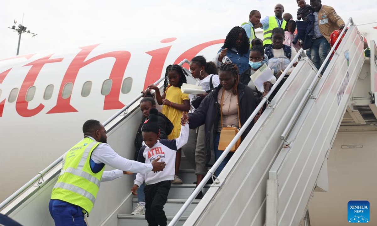 Ghanaian citizens evacuated from South Africa arrive at the Accra International Airport in Accra, Ghana, May 27, 2026. The Ghanaian government has evacuated 300 citizens from South Africa over xenophobic concerns. The first batch, among over 800 citizens registered by the country's mission seeking help to return home, arrived at the Accra International Airport on Wednesday. (Photo by Seth/Xinhua)