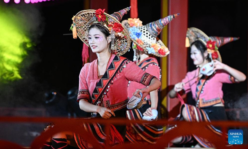 A performance of Li ethnic group is staged at a tourist attraction in Baoting, south China's Hainan Province, May 29, 2026. Rooted in the distinctive traditions of the Li and Miao ethnic groups, the tourist attraction features immersive night tour experiences as its core draw. (Xinhua/Pu Xiaoxu)