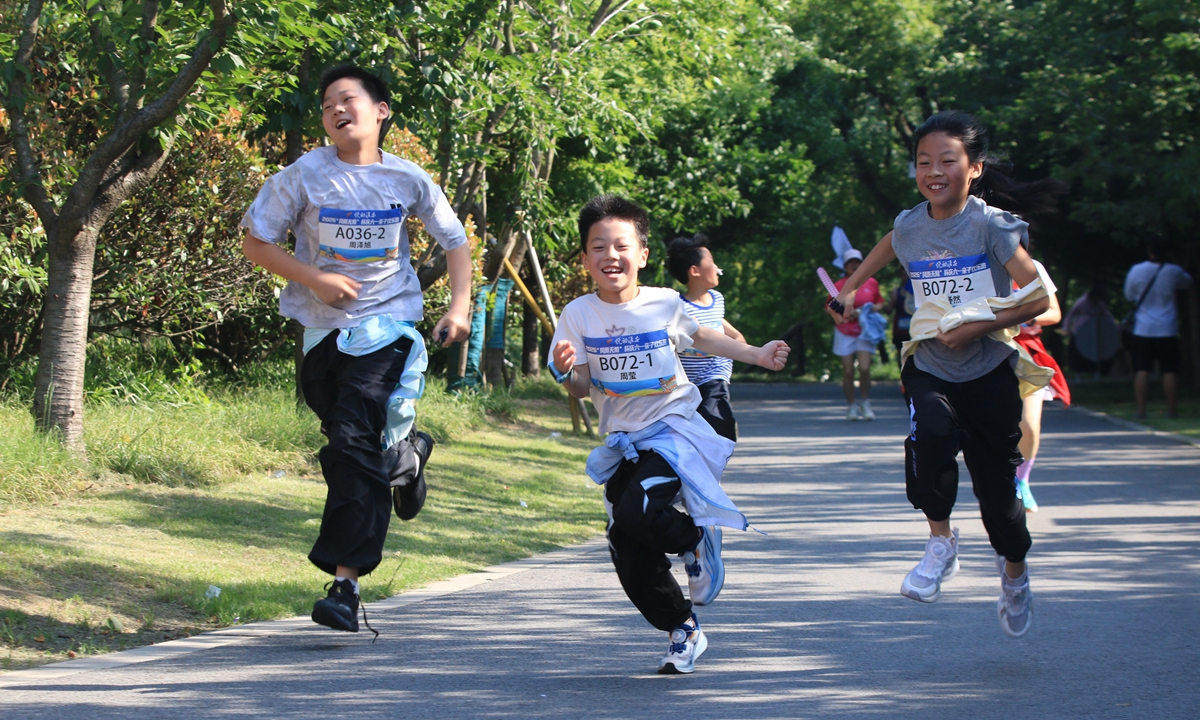 Children run in a 