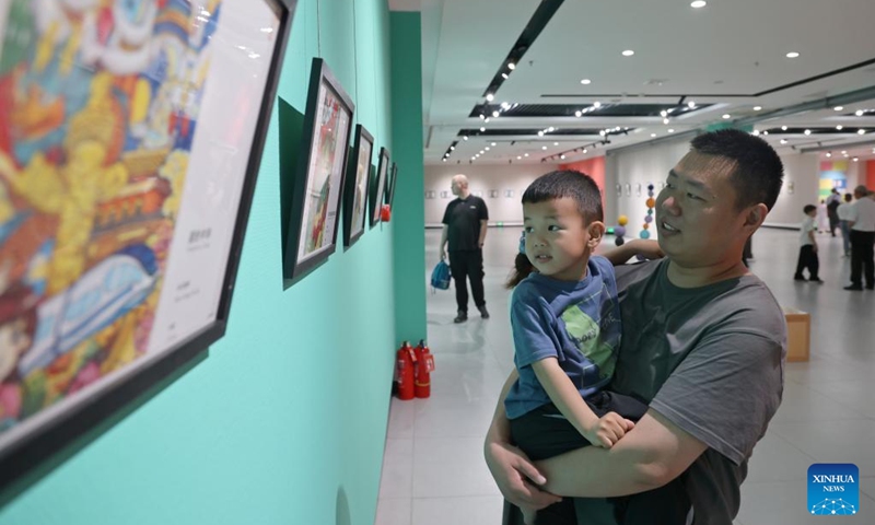 People visit an international youth painting exhibition at an art museum in Lianyungang City, east China's Jiangsu Province, May 30, 2026. (Xinhua/Mao Jun)