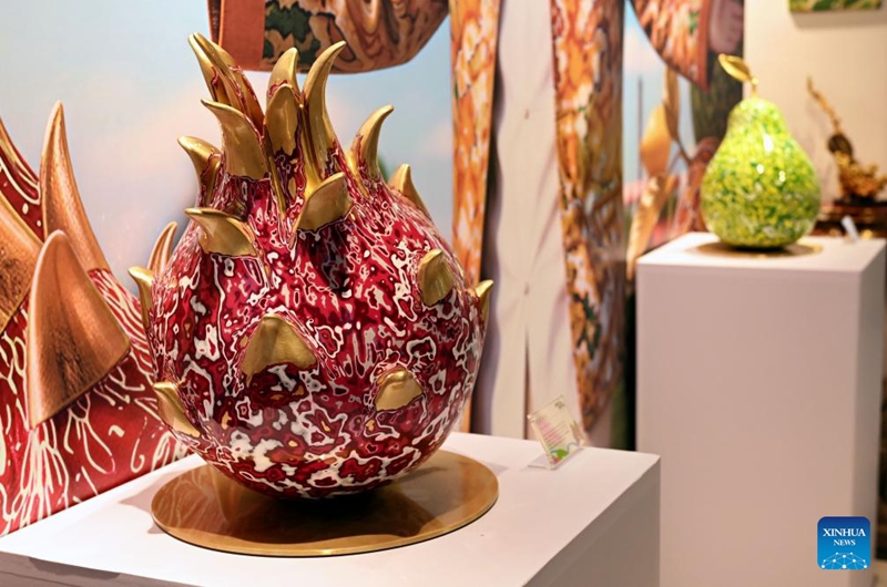 Copper carving artworks are displayed during a pop-up art show titled Zhu Bingren's fruit party in Shanghai, east China, May 30, 2026. The show will last until June 29. (Xinhua/Liu Ying)