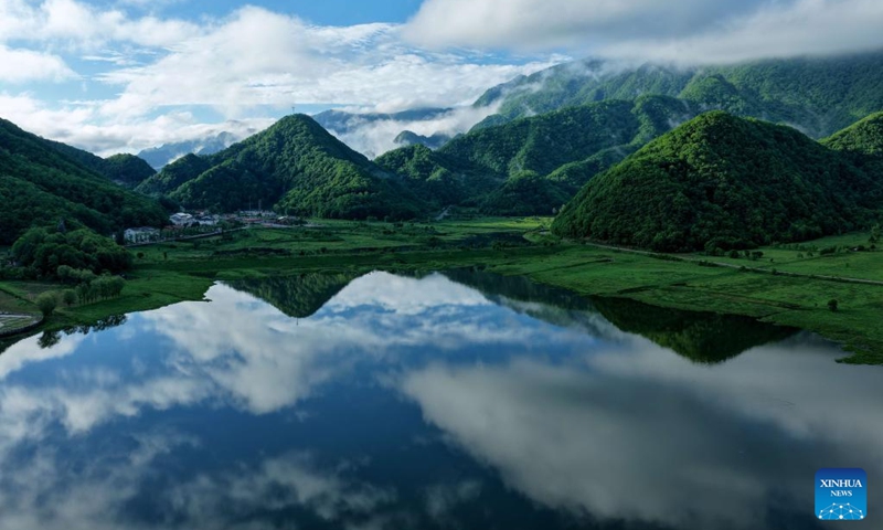 A drone photo taken on May 30, 2026 shows the scenery of the Dajiu Lake in Shennongjia, central China's Hubei Province. (Photo by Song Wen/Xinhua)