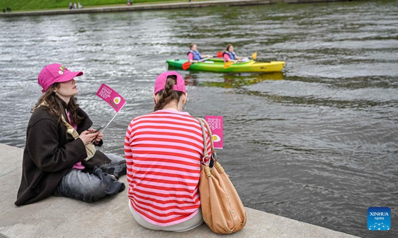 People take part in the Vilnius Pink Soup Fest in Vilnius, Lithuania, on May 30, 2026. Thousands of residents and tourists joined the annual event here on Saturday celebrating Lithuania's iconic summer dish, saltibarsciai (cold beet soup) with parades, concerts, sports activities, and other cultural events. (Photo by Alfredas Pliadis/Xinhua)