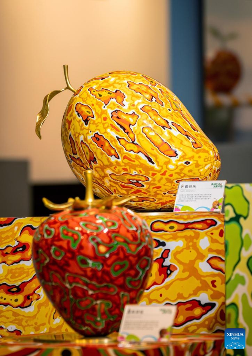 Copper carving artworks are displayed during a pop-up art show titled Zhu Bingren's fruit party in Shanghai, east China, May 30, 2026. The show will last until June 29. (Xinhua/Liu Ying)
