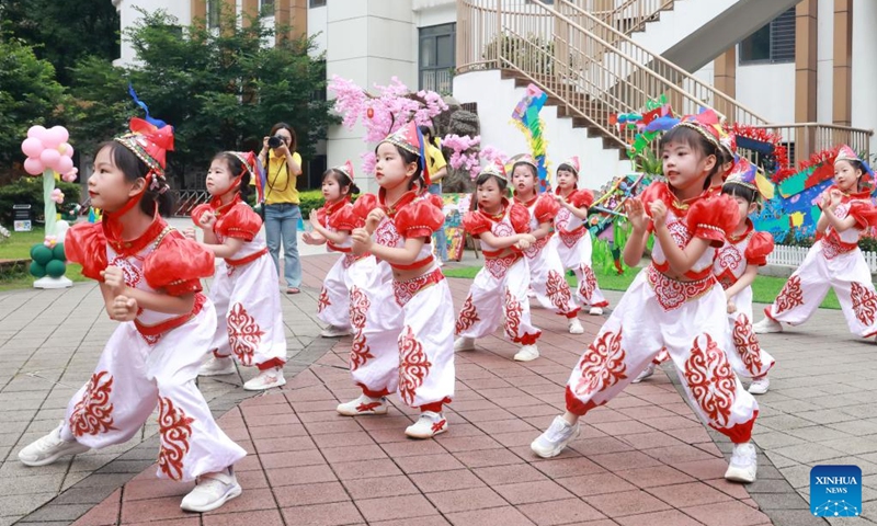 Children dance at a kindergarten in Wuhan, central China's Hubei Province, May 29, 2026. Various events are held across the country to celebrate the upcoming International Children's Day. (Photo by Zhao Jun/Xinhua)