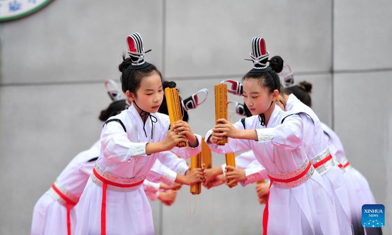 Pupils chant ancient poems during an event to celebrate International Children's Day in Zigui County of Yichang City, central China's Hubei Province, May 29, 2026. Various events are held across the country to celebrate the upcoming International Children's Day. (Photo by Wang Huifu/Xinhua)