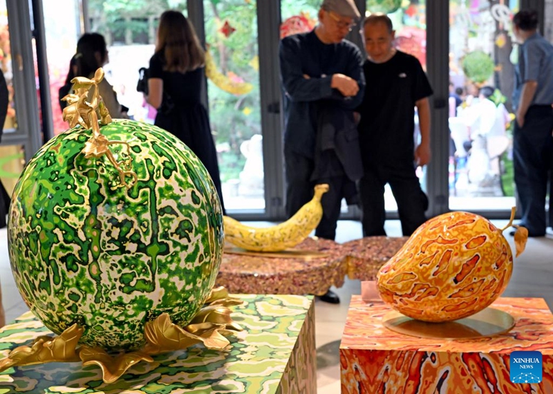 Copper carving artworks are displayed during a pop-up art show titled Zhu Bingren's fruit party in Shanghai, east China, May 30, 2026. The show will last until June 29. (Xinhua/Liu Ying)
