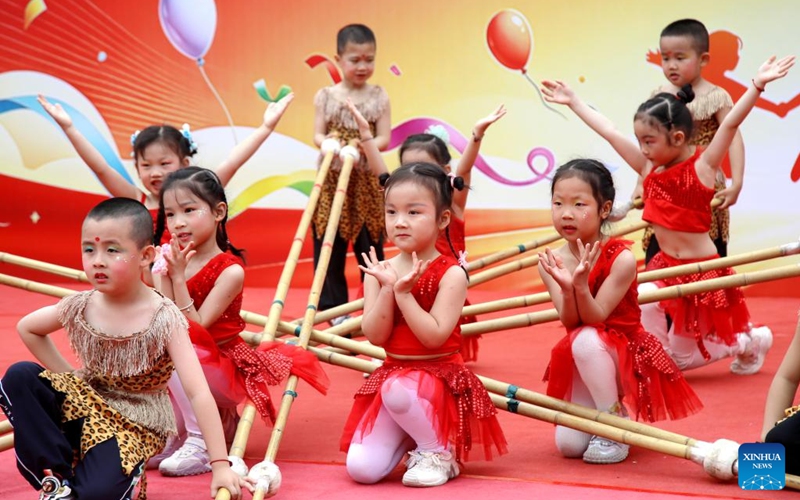 Children perform during an event to celebrate International Children's Day in Shiyan, central China's Hubei Province, May 29, 2026. Various events are held across the country to celebrate the upcoming International Children's Day. (Photo by Cao Zhonghong/Xinhua)