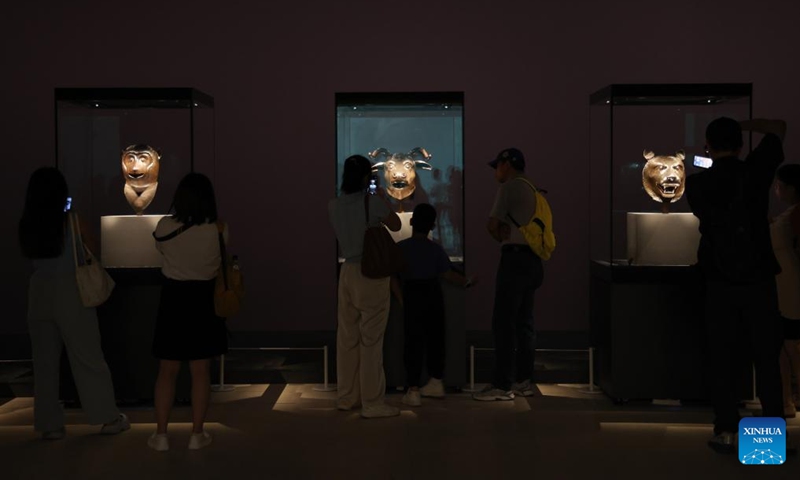 Visitors view the bronze animal head sculptures of Yuanmingyuan at the Shenzhen International Museum of Art in Shenzhen, south China's Guangdong Province, May 30, 2026. The museum officially opened to the public on Saturday. Photo: Xinhua