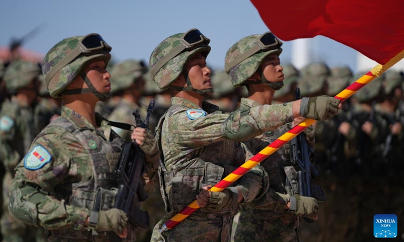This photo taken on May 30, 2026 shows the flag bearer and flag escorts from China during a joint army training exercise in north China's Inner Mongolia. China and Mongolia on Saturday launched a joint army training exercise, code-named Steppe Partner 2026, in north China's Inner Mongolia. (Photo by Fu Zhixiang/Xinhua)