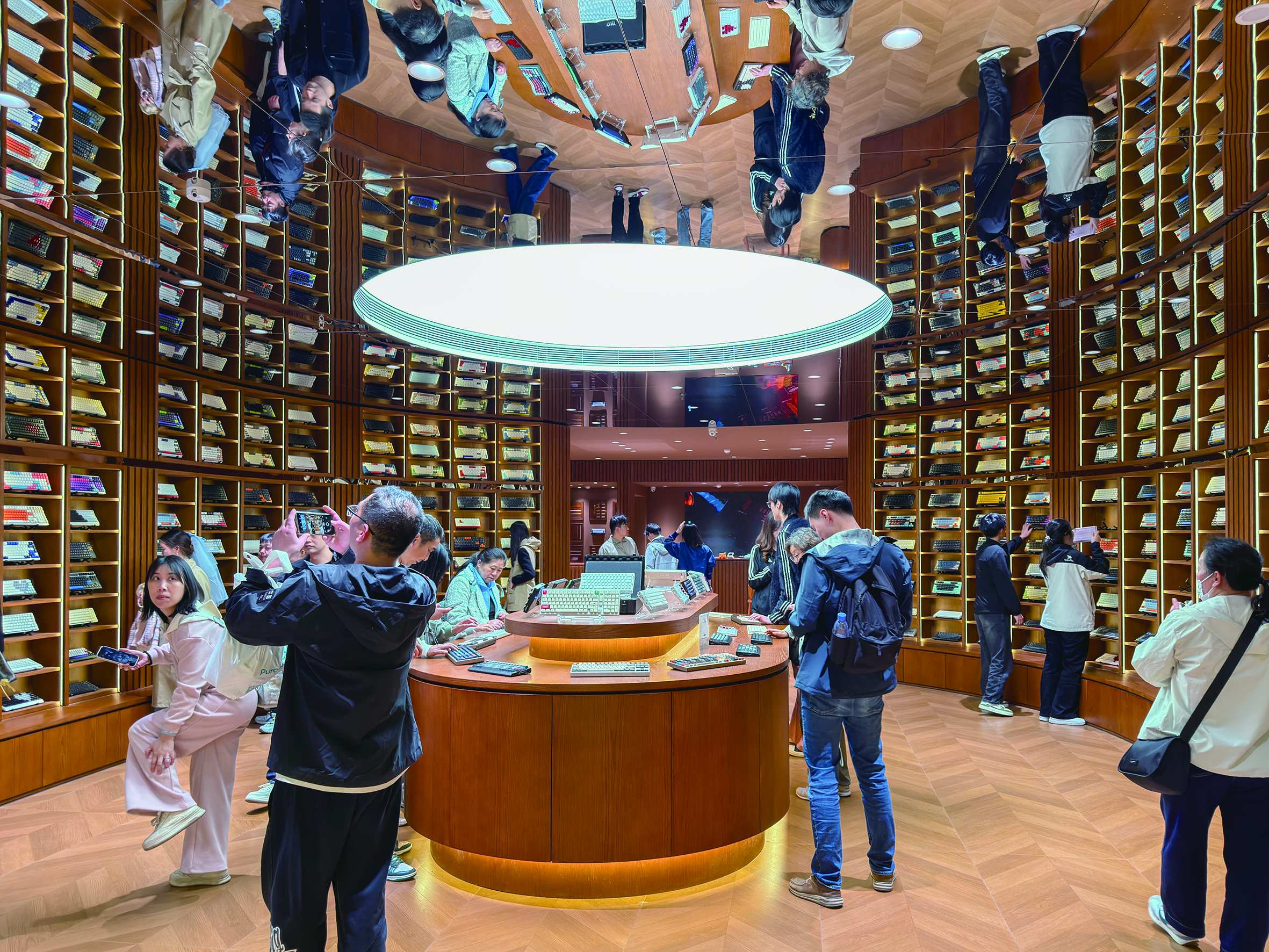 Customers experience mechanical keyboards at the IQUNIX flagship store in Guangzhou, South China's Guangdong Province, on May 5, 2026. Photo: VCG