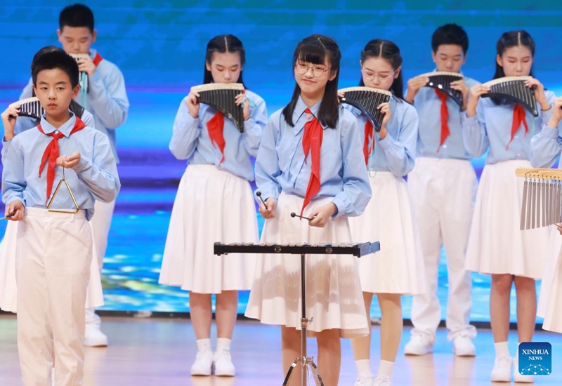 Students perform during a middle and primary school art show in Wuhan, central China's Hubei Province, May 27, 2026. Various events are held across the country to celebrate the upcoming International Children's Day. (Photo by Zhao Jun/Xinhua)