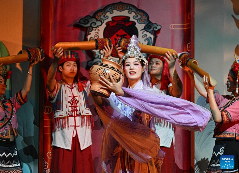 A performance of Li ethnic group is staged at a tourist attraction in Baoting, south China's Hainan Province, May 28, 2026. Rooted in the distinctive traditions of the Li and Miao ethnic groups, the tourist attraction features immersive night tour experiences as its core draw. (Xinhua/Pu Xiaoxu)