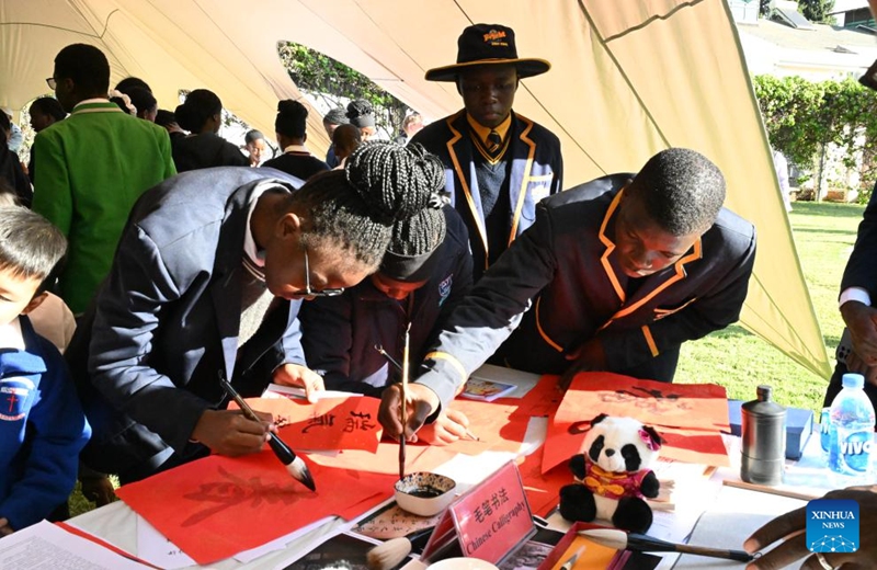 Zimbabwean students write Chinese calligraphy at the Chinese Embassy in Harare, Zimbabwe, on May 29, 2026. Scores of students from schools across Zimbabwe on Friday experienced Chinese culture at the Chinese Embassy in Zimbabwe during a joint celebration of International Children's Day, which is observed annually on June 1. (Xinhua/Xu Zheng)