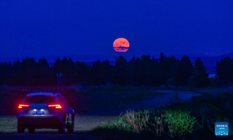The full moon, known as the Blue Moon, is seen over Jiayin County, northeast China's Heilongjiang Province, May 31, 2026. (Photo by Li Shaojun/Xinhua)