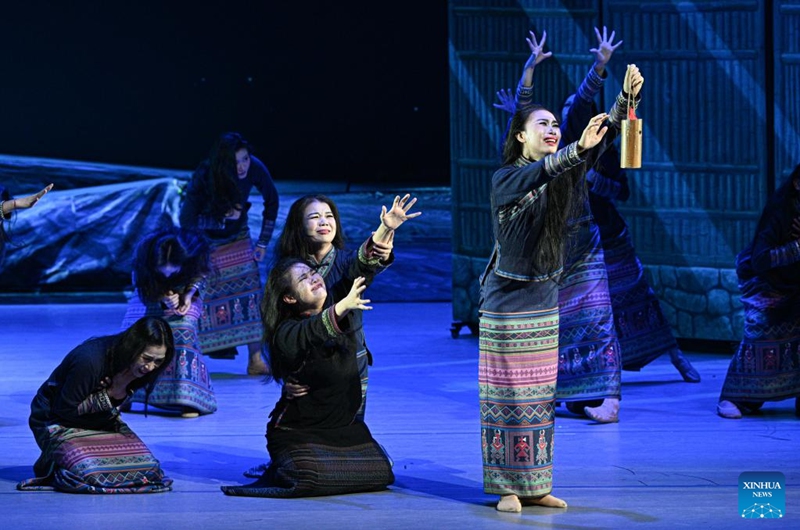 Actors take part in the performance of Gan Gong Bird at a theatre in Baoting, south China's Hainan Province, May 30, 2026. The original ethnic dance drama Gan Gong Bird has been staged here for free every Saturday to enrich people's cultural life. (Xinhua/Pu Xiaoxu)