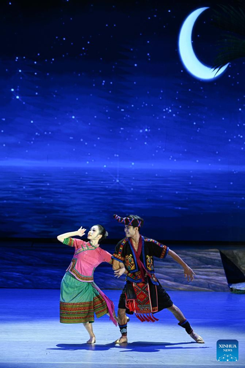 Actors take part in the performance of Gan Gong Bird at a theatre in Baoting, south China's Hainan Province, May 30, 2026. The original ethnic dance drama Gan Gong Bird has been staged here for free every Saturday to enrich people's cultural life. (Xinhua/Pu Xiaoxu)