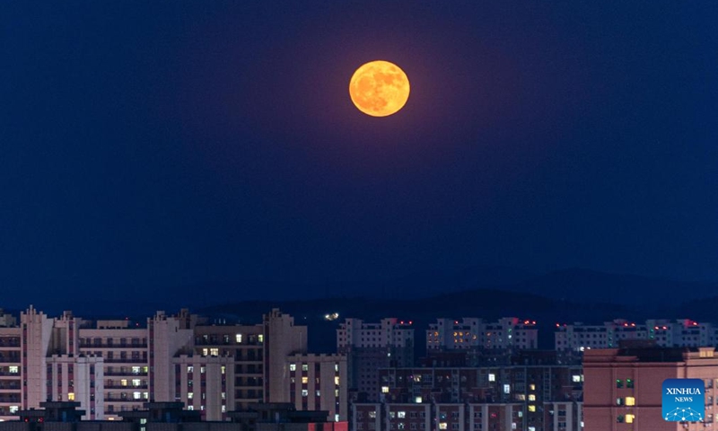 The full moon, known as the Blue Moon, is seen over Jiamusi City, northeast China's Heilongjiang Province, May 31, 2026. (Photo by Chen Zhiguo/Xinhua)