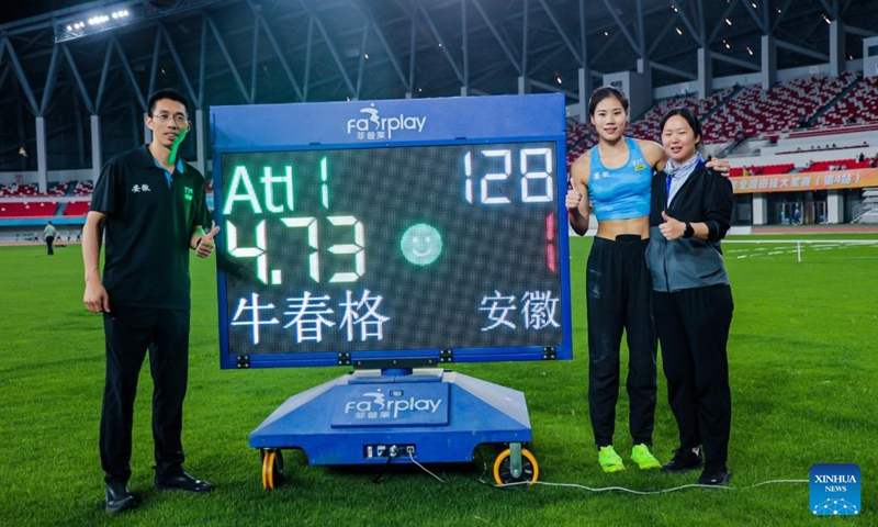 Niu Chunge (2nd R) celebrates after setting a new Asian record of 4.73m in the women's pole vault final 2026 National Athletics Grand Prix in Bengbu City, east China's Anhui Province, May 31, 2026. (Photo by Chen Bo/Xinhua)