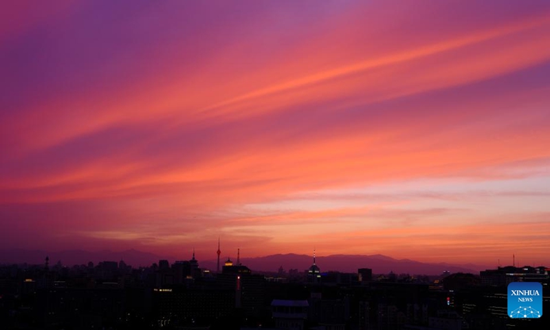 This photo taken on May 31, 2026 shows a view of the sunset glow in Xicheng District of Beijing, capital of China. (Xinhua/Chen Yehua)