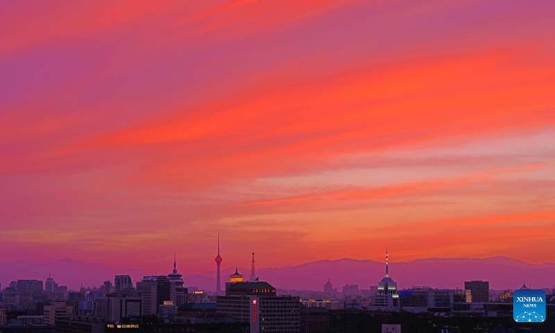 This photo taken on May 31, 2026 shows a view of the sunset glow in Xicheng District of Beijing, capital of China. (Xinhua/Chen Yehua)