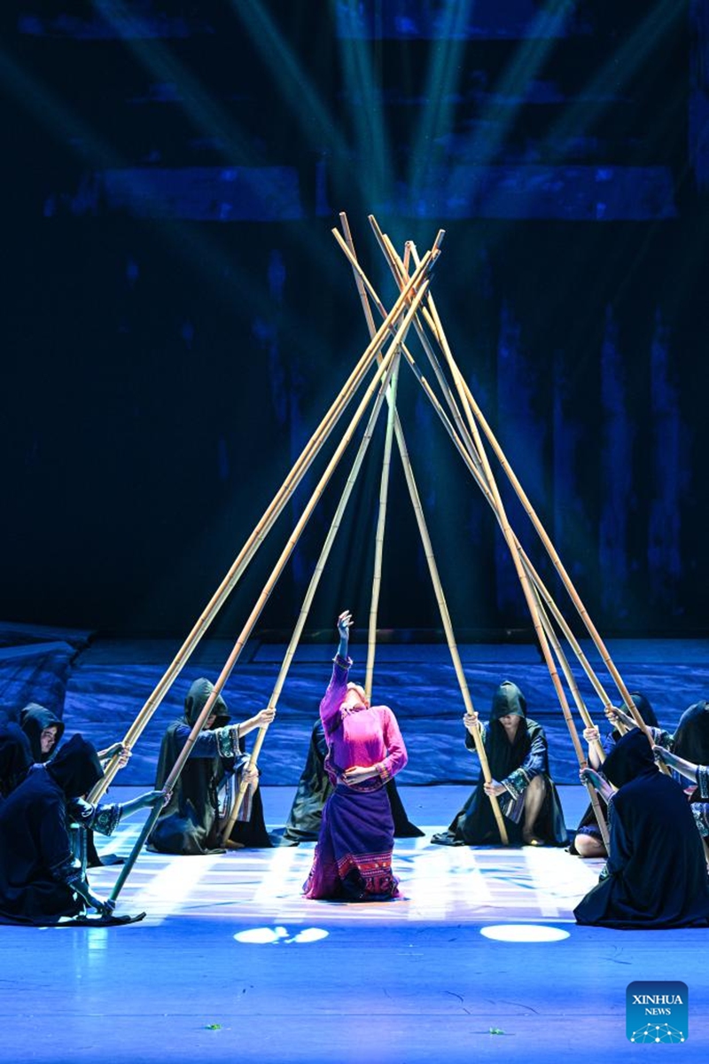 Actors take part in the performance of Gan Gong Bird at a theatre in Baoting, south China's Hainan Province, May 30, 2026. The original ethnic dance drama Gan Gong Bird has been staged here for free every Saturday to enrich people's cultural life. (Xinhua/Pu Xiaoxu)
