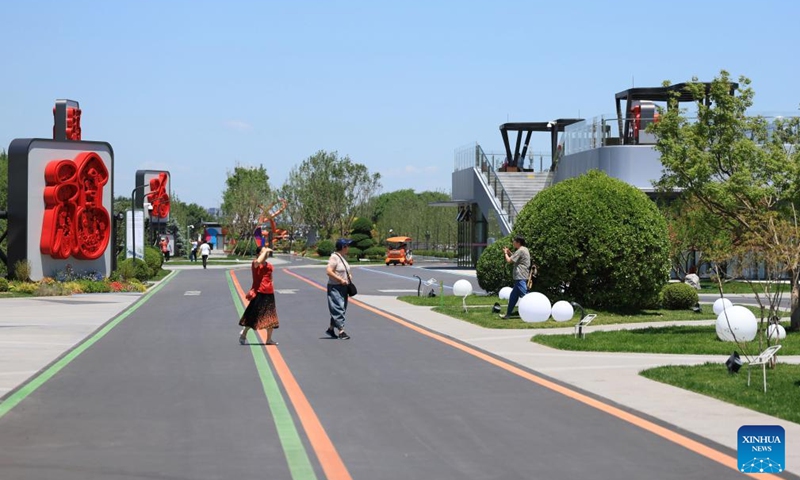 Tourists visit a park in the Beijing Municipal Administrative Center in Beijing, capital of China, May 29, 2026. From 2016 to 2026, the Beijing Municipal Administrative Center marks a decade of planning and development. Over the past ten years, it has undergone a remarkable transformation into a vibrant modern area. Photo: Xinhua