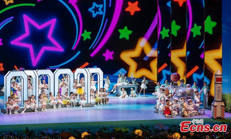 Young performers, including teenagers from the Macao Special Administrative Region, present a technology-themed program at the National Centre for the Performing Arts in Beijing. Photo: China News Service