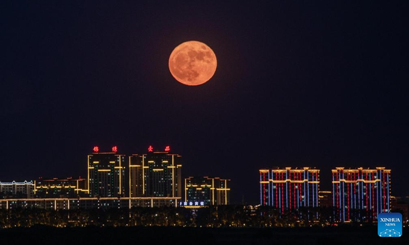 The full moon, known as the Blue Moon, is seen over Fujin City, northeast China's Heilongjiang Province, May 31, 2026. (Photo by Geng Xiqing/Xinhua)