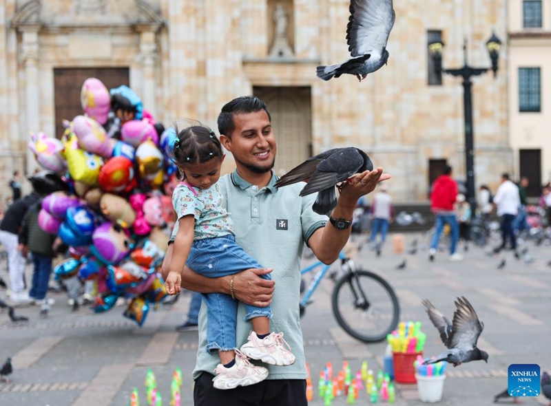 People spend their time at the Bolivar Square in Bogota, capital of Colombia, May 30, 2026. (Xinhua/Zhou Jiayi)