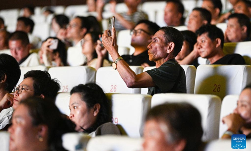 People watch the performance of Gan Gong Bird at a theatre in Baoting, south China's Hainan Province, May 30, 2026. The original ethnic dance drama Gan Gong Bird has been staged here for free every Saturday to enrich people's cultural life. (Xinhua/Pu Xiaoxu)